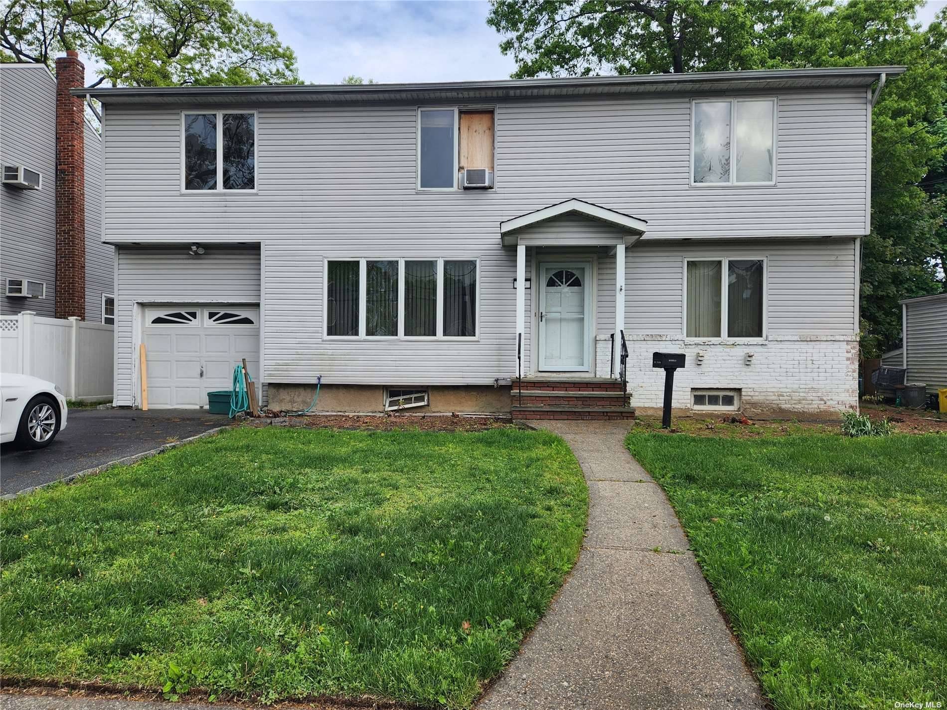 Large Colonial in the middle of Massapequa Park Village.