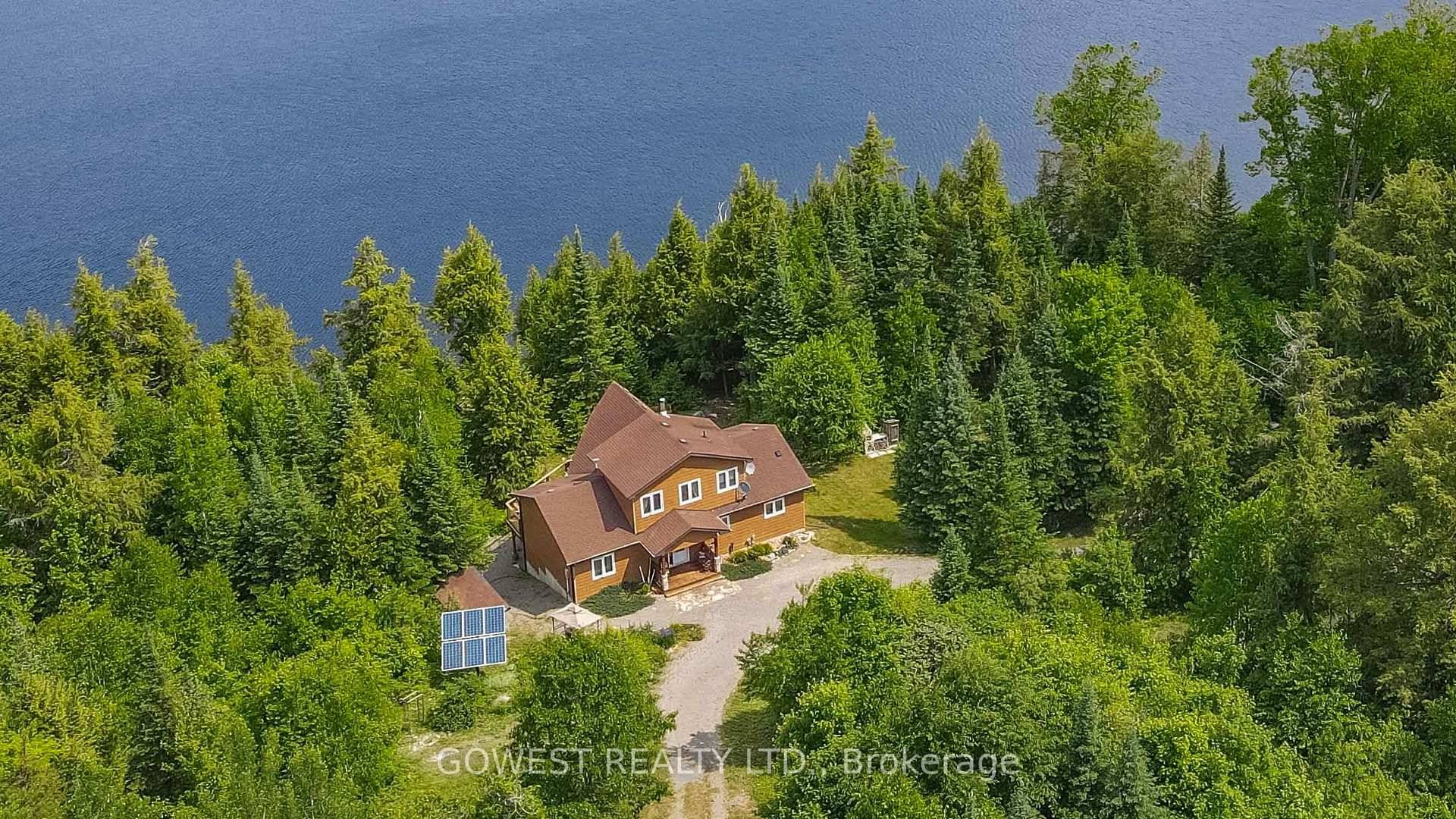 Absolutely Stunning Custom Built Four Season Lakeside Home Cottage One of the Most Beautiful Properties in the Barry's Bay Area Set on a private, tree lined lot along the shores ...