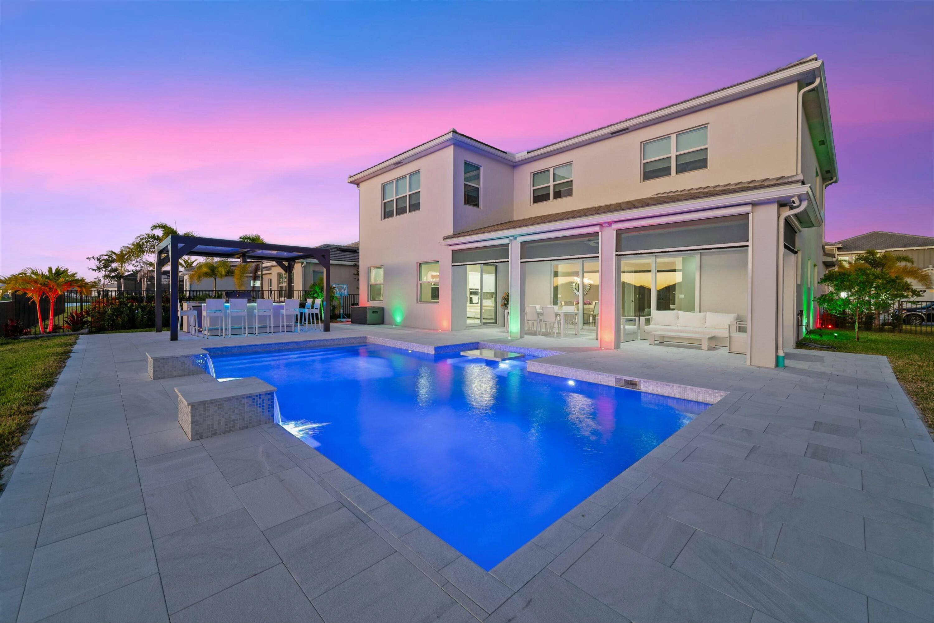 Introducing the epitome of luxury living an extraordinary Kestrel model in the prestigious Orchards Community, featuring a stunning pool with double waterfall and sitting and table area to enjoy a ...
