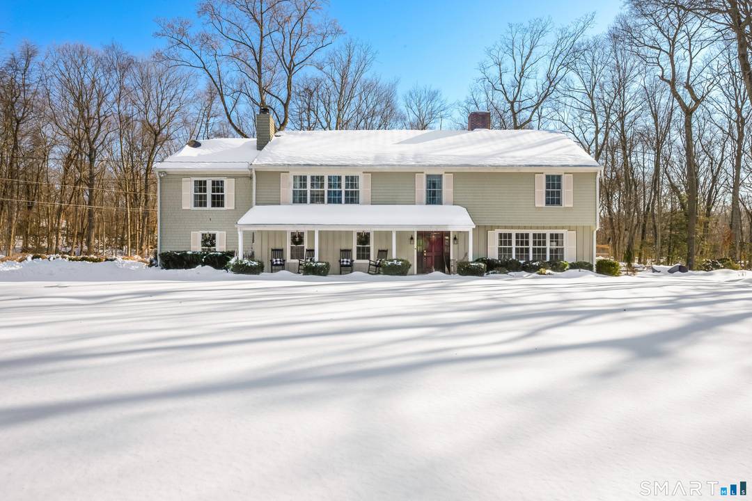 This beautifully updated 4 bedroom, 3 bath home offers living in one of Wilton's most sought after locations near the Lake Club.