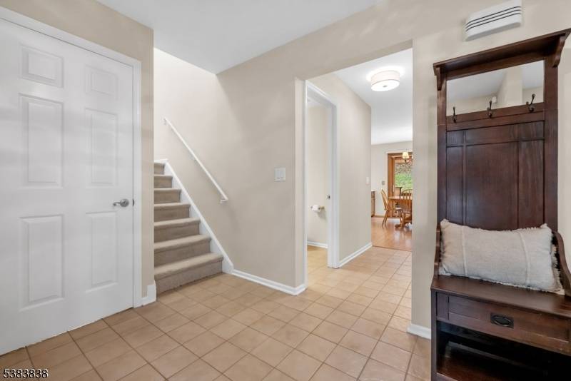 Welcome home to this stunning townhome in highly coveted Mountain Ridge.
