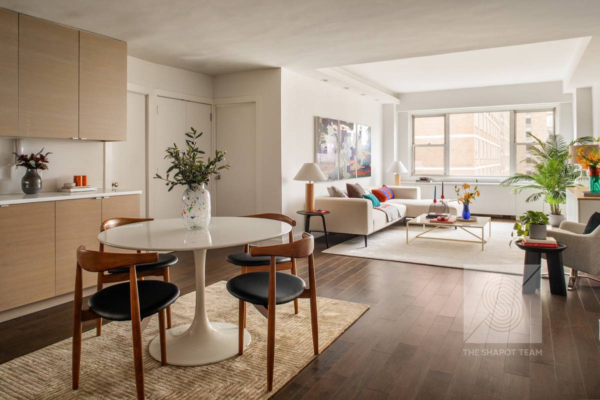 A SYMPHONY IN THE SKY Step into a harmonious blend of elegance and light in this meticulously renovated residence an architectural masterpiece set above iconic Lincoln Center.