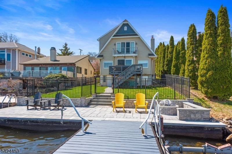 Welcome to your new lake home, magnificent renovated lake style custom cape, offers open floor plan, lake views that mesmerize !