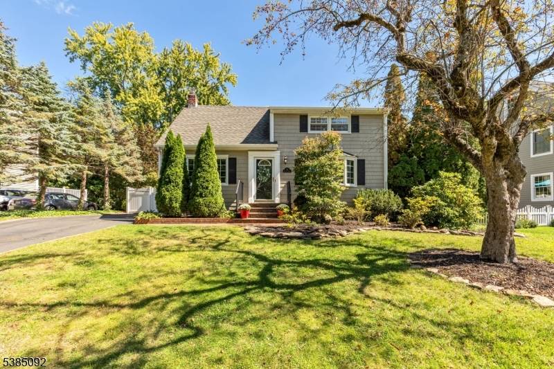 Welcome to this perfectly located, charming colonial on a local street.