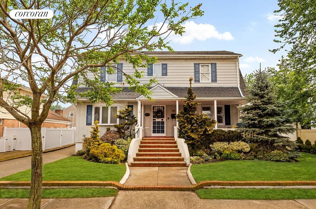 Charming and Inviting Center Hall Colonial in the Heart of Neponsit.