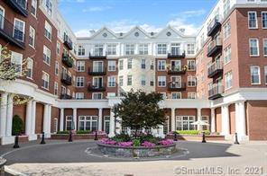 Two bedroom, 2. 5 bath unit with office at The Heritage in Blue Back Square steps to restaurants and shops.