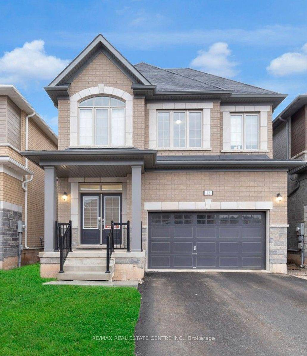 Stunning 4 bedroom fully detached home with 2 car garage, located in the heart of Erin !