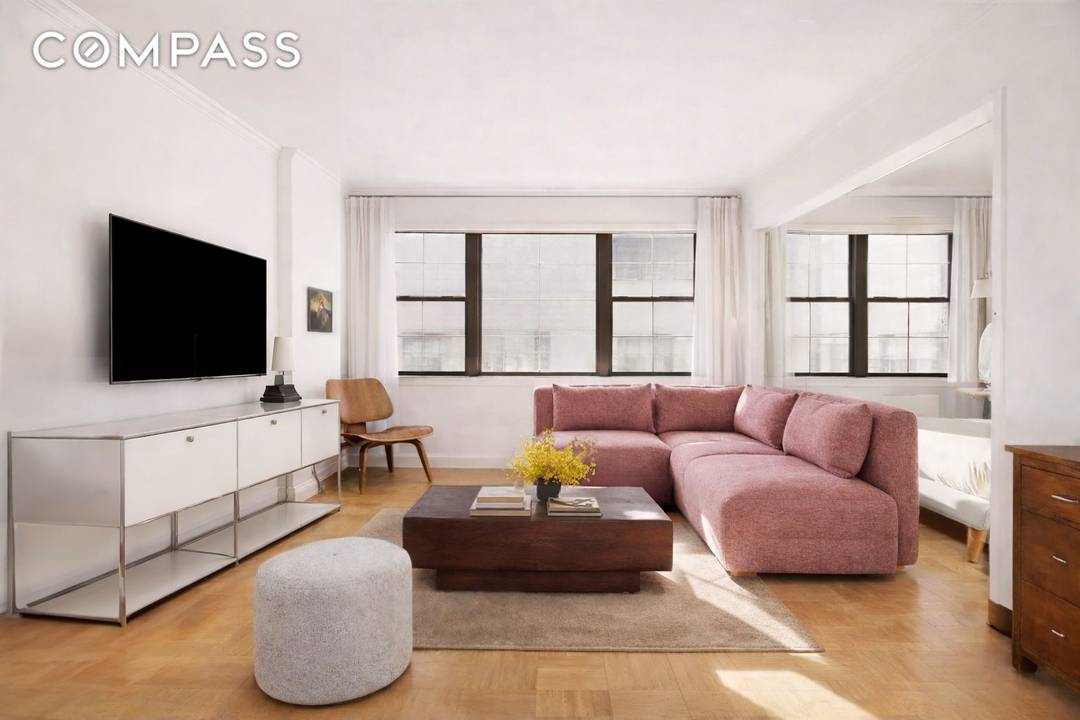 Some images have been virtually staged This south facing alcove studio apartment features a spacious layout with a generous living area, a dedicated dining space, a large kitchen, and a ...