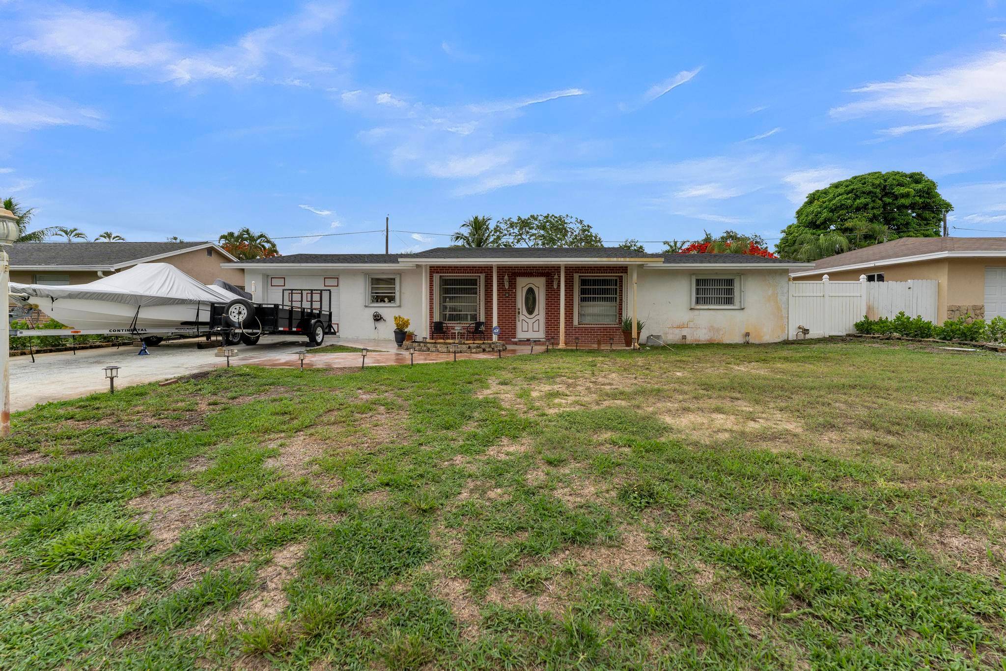 Welcome to 2745 Cambridge Rd a beautifully updated 3 bedroom, 2 bathroom home in the heart of Lantana.