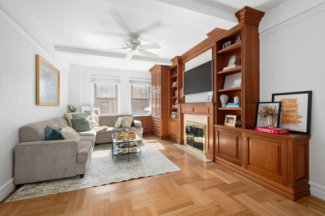 Steps from Fifth Avenue and Central Park, this sun filled, south facing prewar home delivers scale, character, and flexibility.