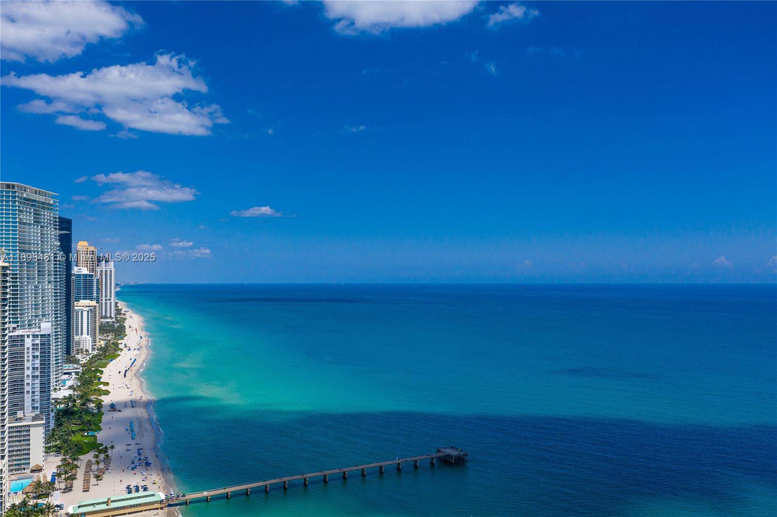An exceptional waterfront residence nestled within the exclusive and secure Poinciana Island community.