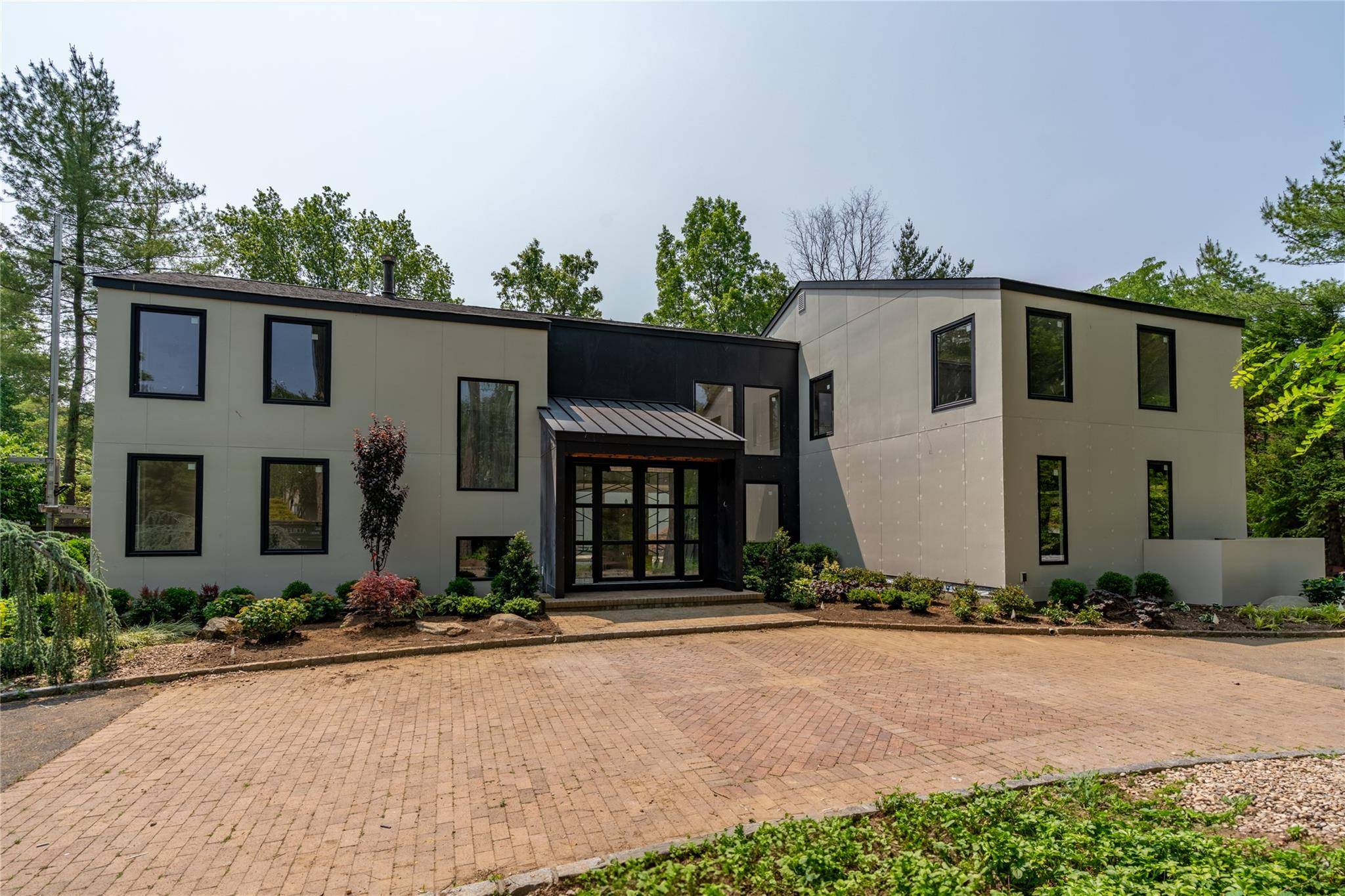 Elegant Contemporary Colonial Fully Renovated with Modern Flare.