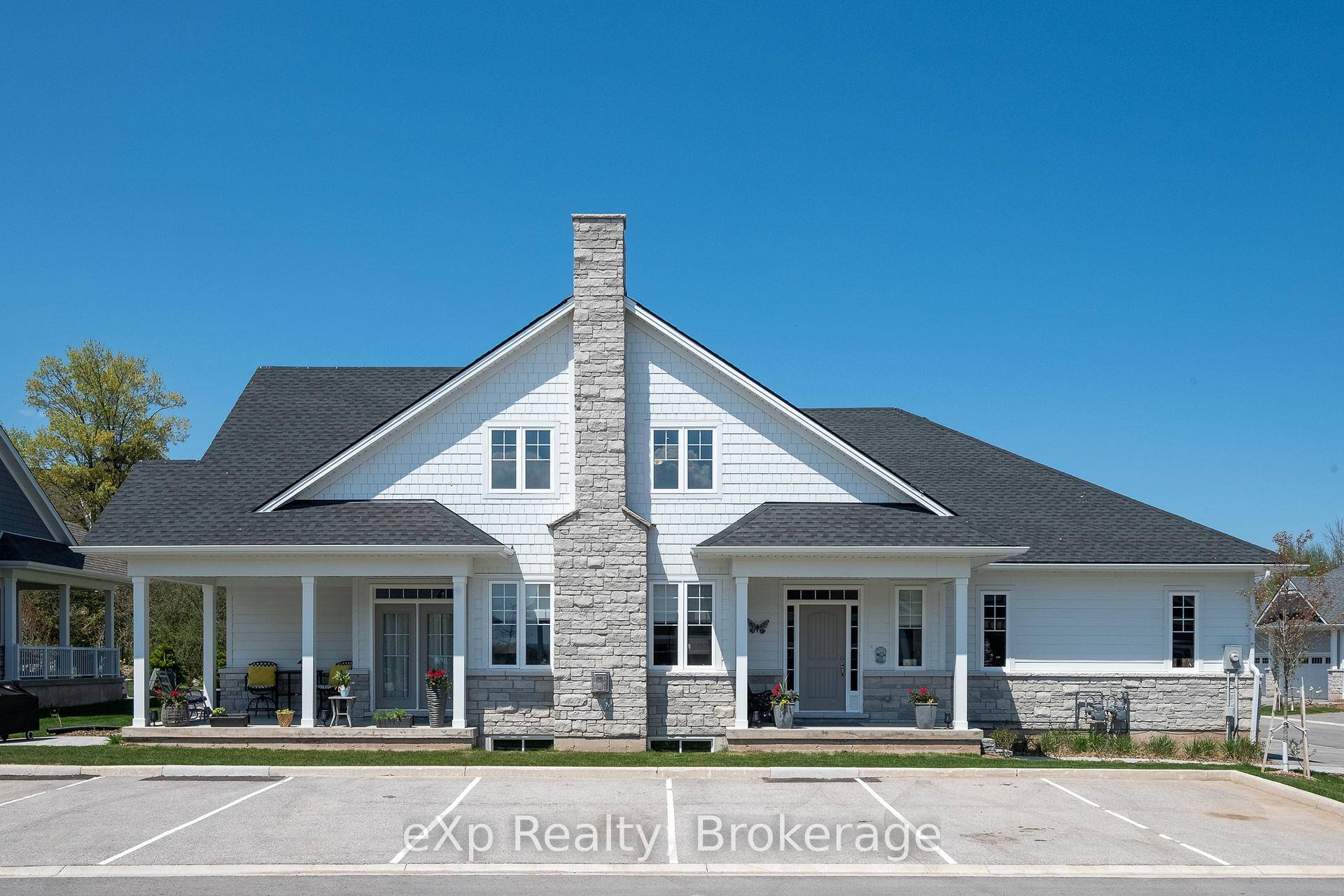Sophisticated yet comfortable, this end unit townhome in the prestigious Cobble Beach community blends refined design with everyday ease.