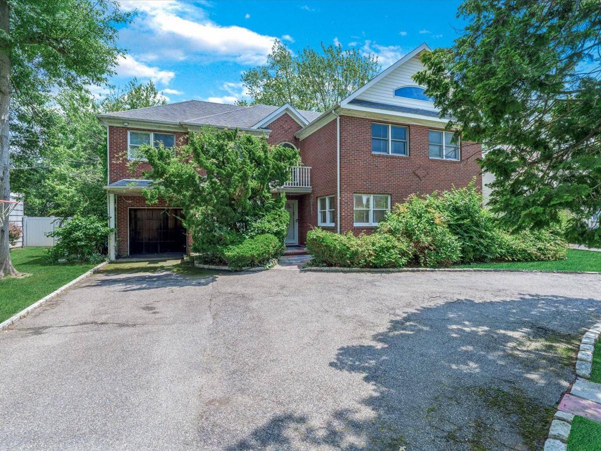 On one the best blocks in Lawrence, this house is in a great location has over 4.