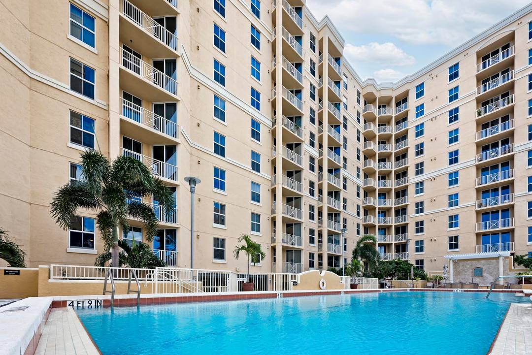 DIRECT east facing views of Intracoastal and ocean are enjoyed from this 3 bedroom plus den, high floor unit located in the most desirable location in downtown West Palm Beach.