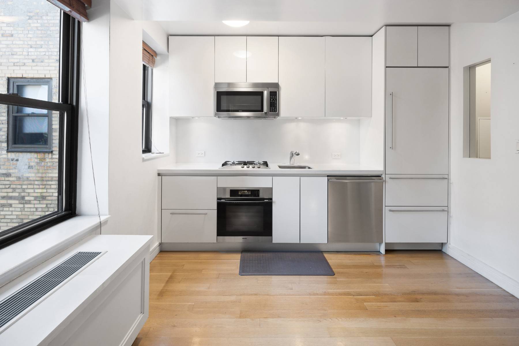 Discover the charm and convenience of Upper West Side living in Unit 18B at 230 Riverside Drive, a stunning prewar condominium building that blends classic architecture with modern amenities.