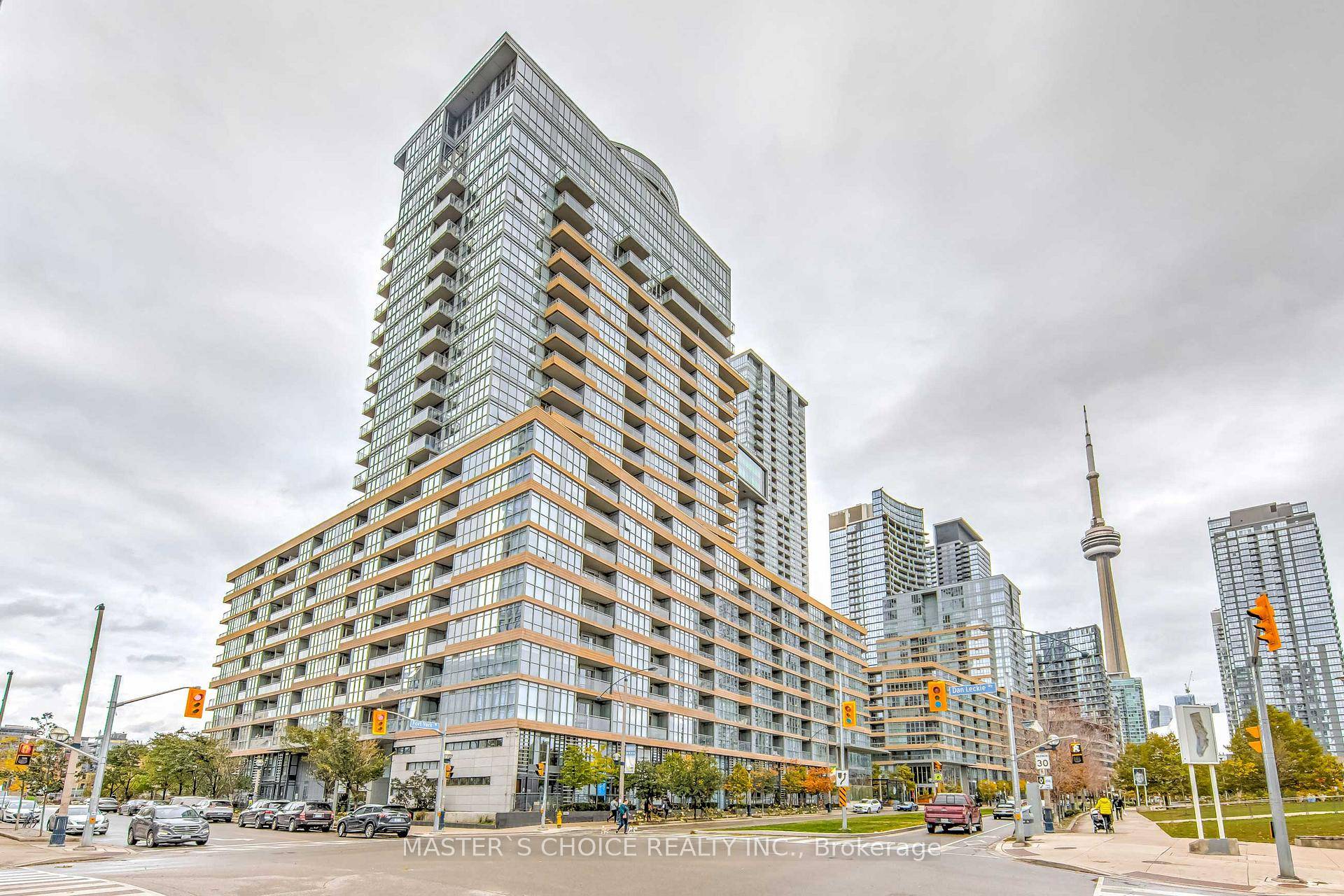 Sun drenched and spectacular 2 bed den 2 bathroom unit in Parade 2 Condos.