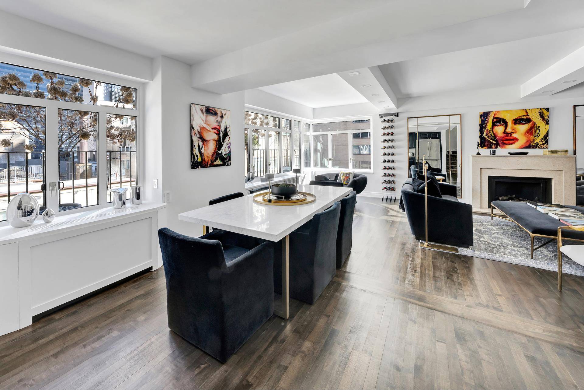 Welcome to Regent House, Residence PHB, a flawlessly renovated two bedroom, two bathroom duplex, with stunning private terraces overlooking the very heart of midtown.