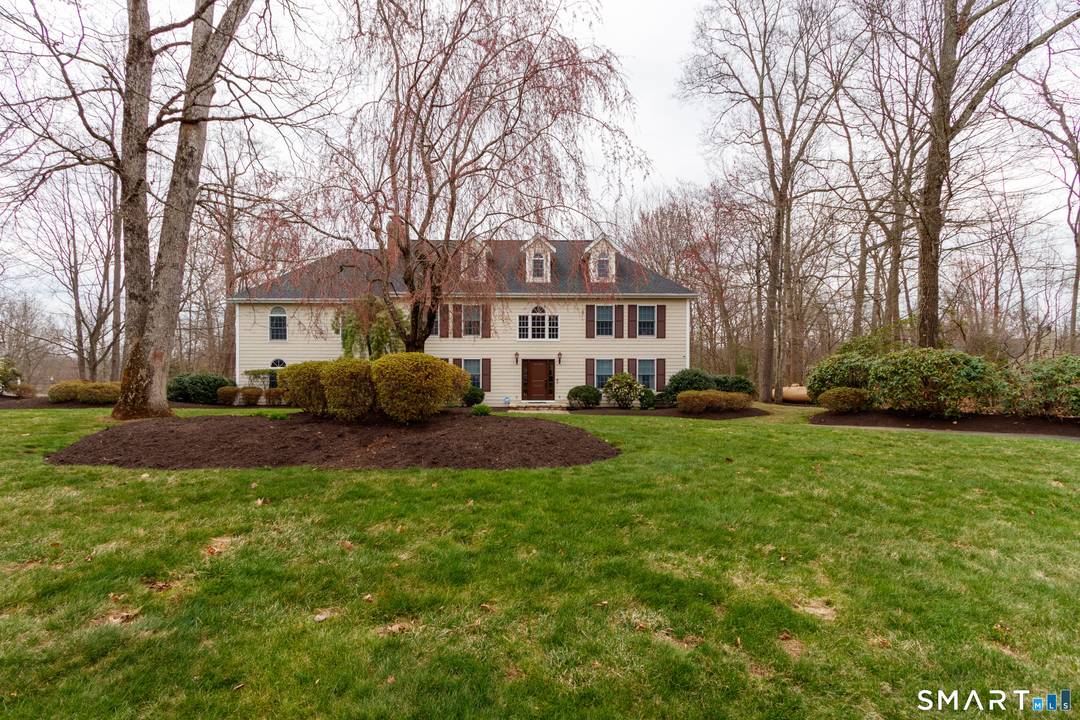 Stately custom built Colonial offering over 3, 400 sq ft of luxury living on a quiet West Woods cul de sac.