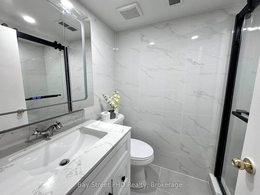 Fully furnished 2 bedroom basement apartment with a private separate entrance in a prime Toronto neighbourhood, featuring two spacious bedrooms 20.