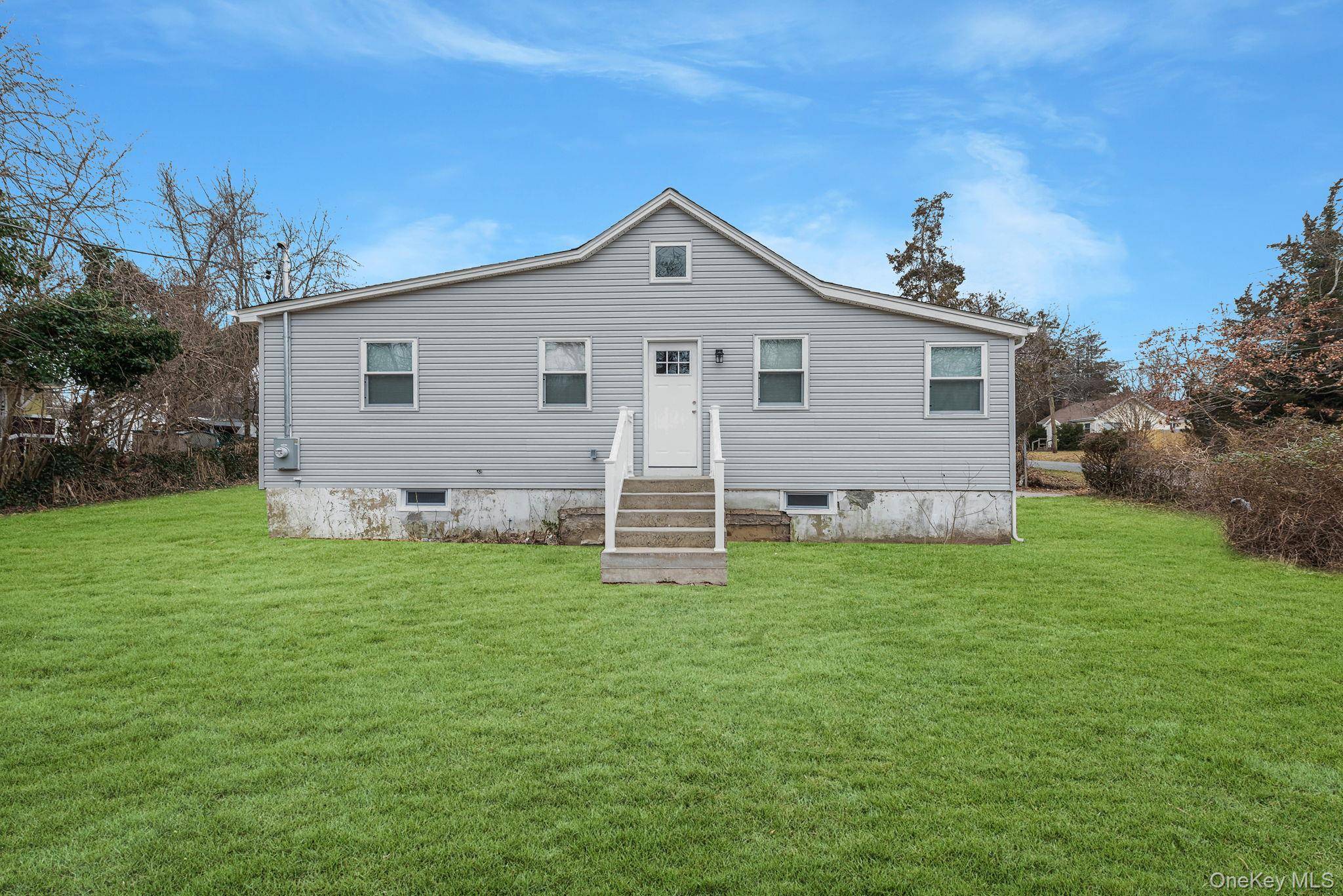 Beautifully Renovated, Spacious 3 Bed, 1 Bath Apartment Rental with Private Entrance and Backyard Conveniently Located in Mastic Beach !