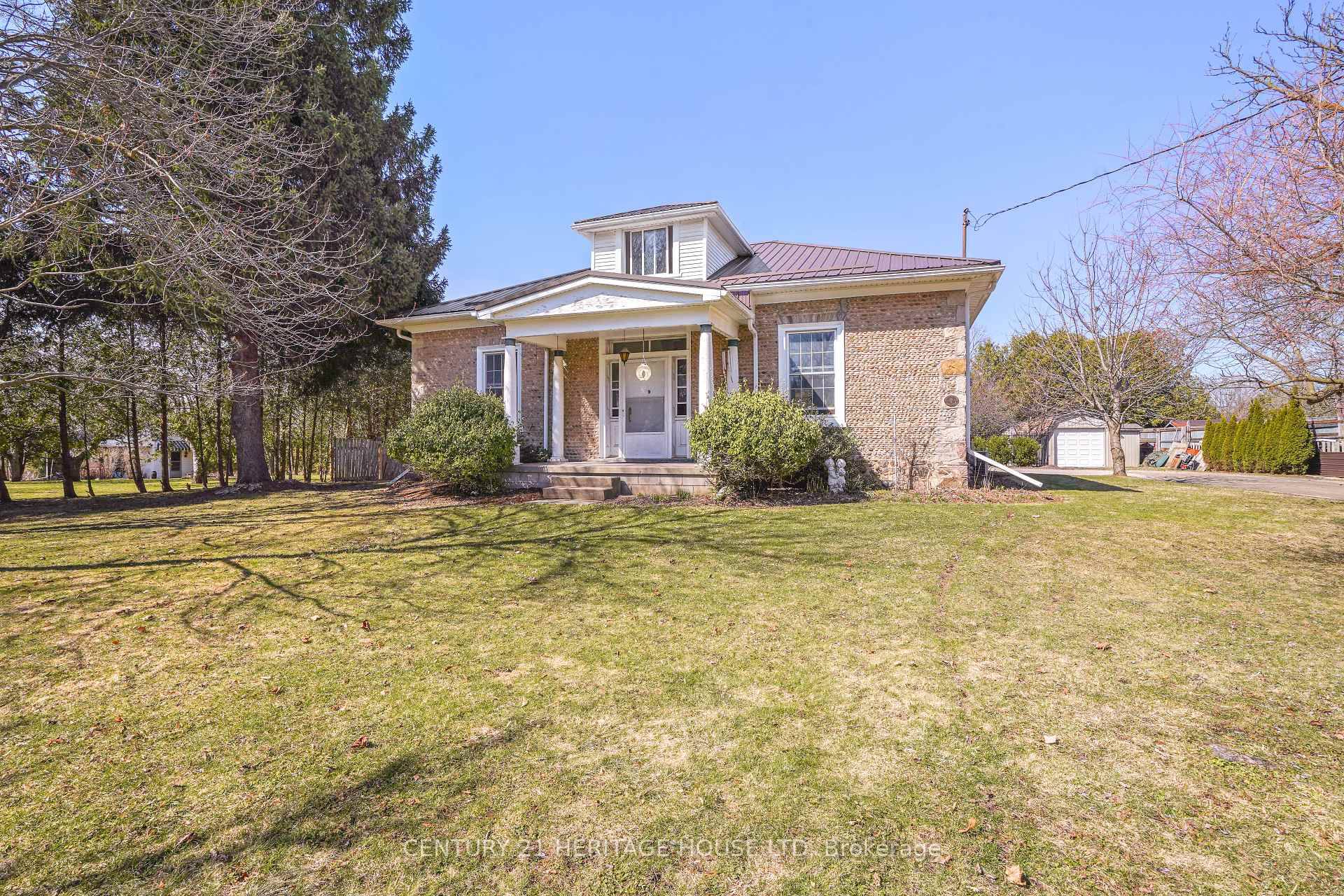 A Beautiful Cobblestone Home on a Large Property !