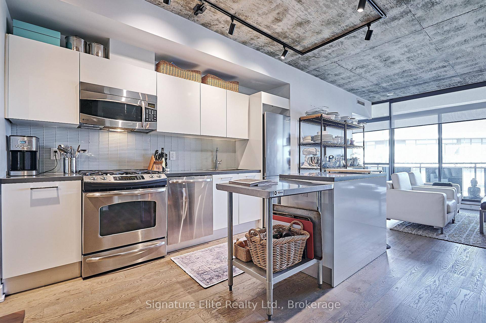 Stunning and spacious 2 bedroom plus den, loft style condo w 2 full bath, available for lease in prime Leslieville !
