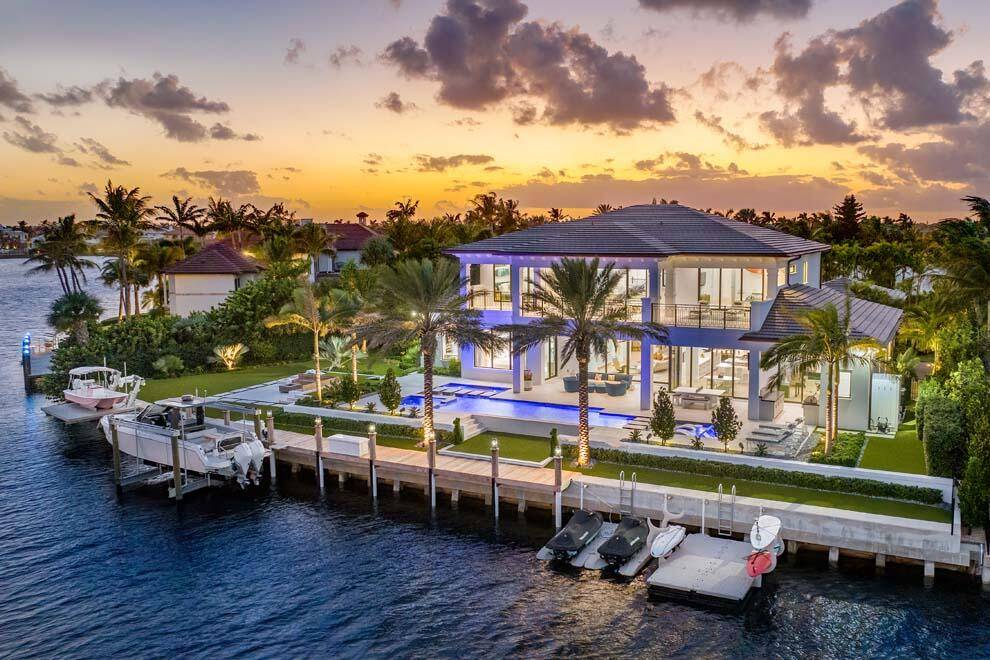 Situated on over one half of an acre with 178 feet of waterfrontage, this Point Manalapan estate checks all the boxes for luxury living.