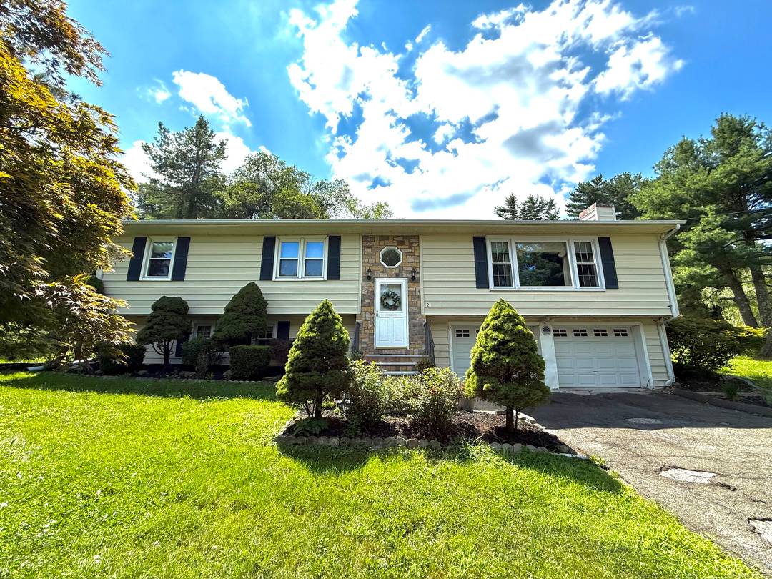Welcome to this inviting home featuring a spacious living room with a cozy fireplace and an open kitchen dining area that makes everyday living and entertaining easy.