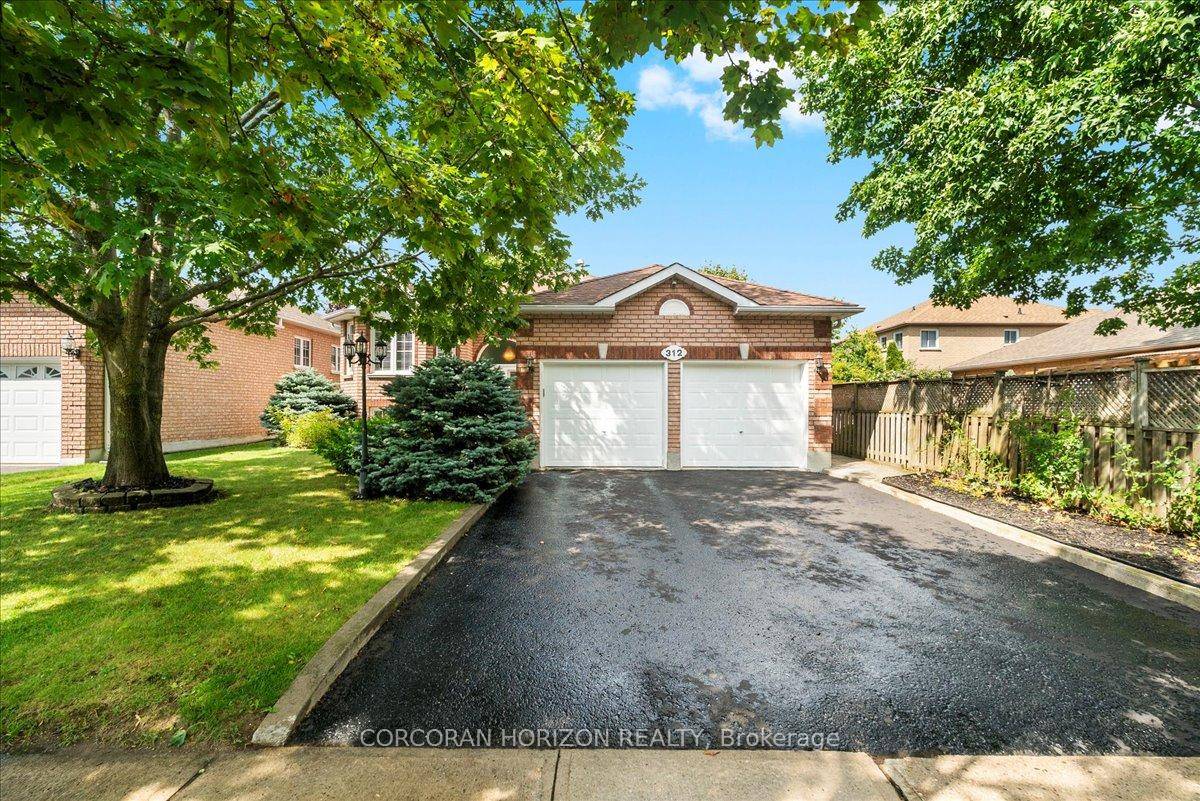 Absolutely stunning 3bd 2bath detached brick bungalow on large 49ft X 115ft lot !