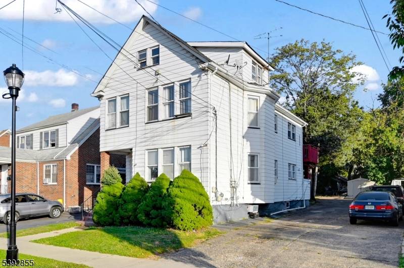 Opportunity Knocks ! Two Family Fixer Upper Near Rutgers University.