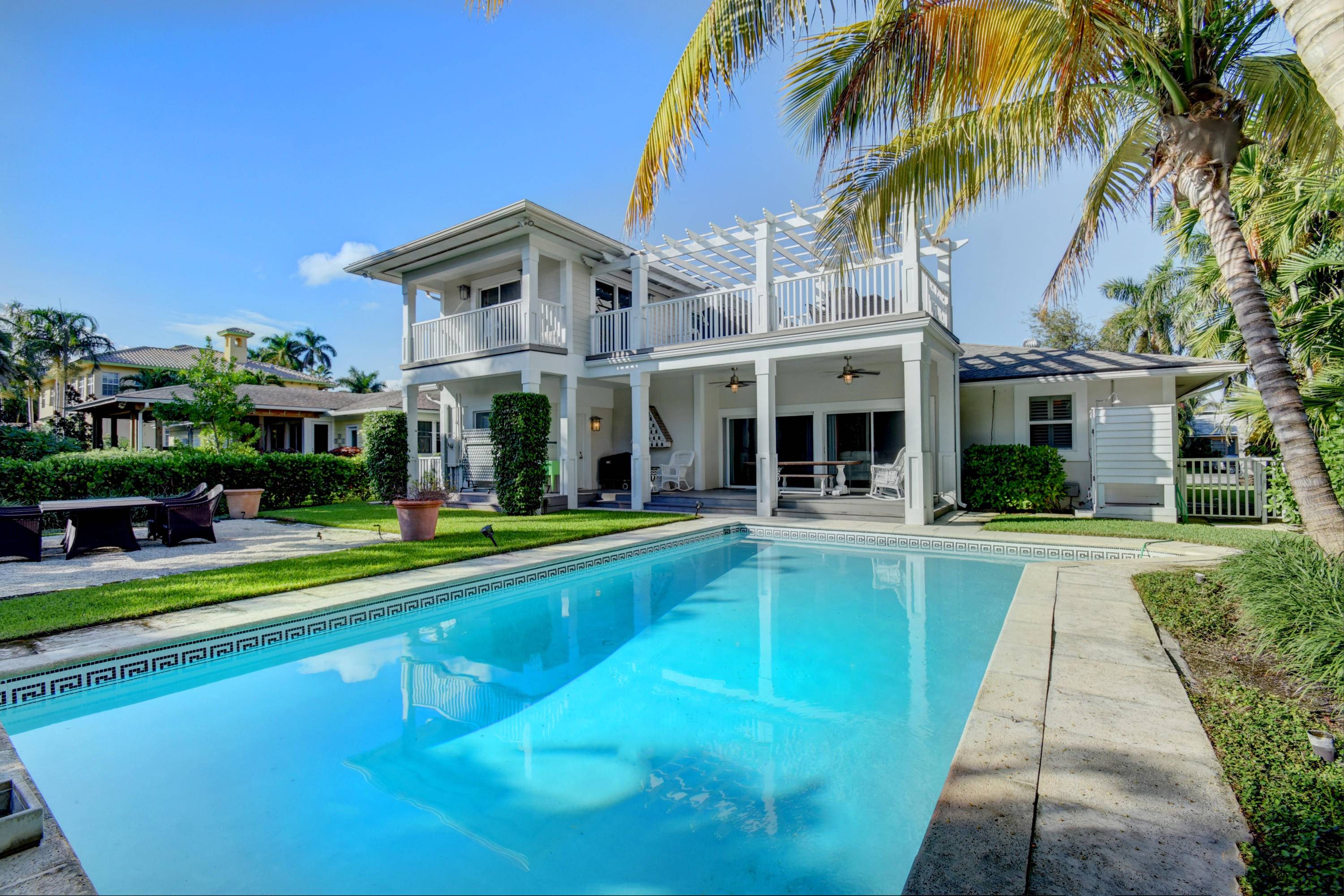 STUNNING 6 BEDROOM HOME JUST 2 BLOCKS FROM THE BEACH, 1 BLOCK FROM THE INTRACOASTAL, AND 5 BLOCKS NORTH OF EXCITING ATLANTIC AVENUE !