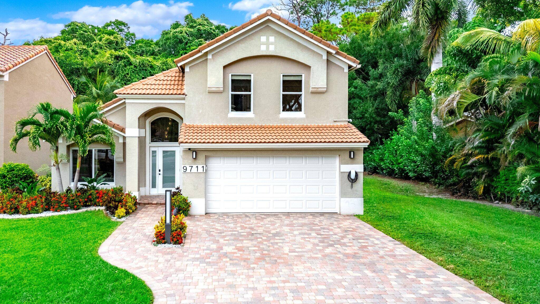 Rarely available, fully remodeled home in the intimate, low HOA, all ages community of Villaggio of Boca Raton, with less than 40 homes.