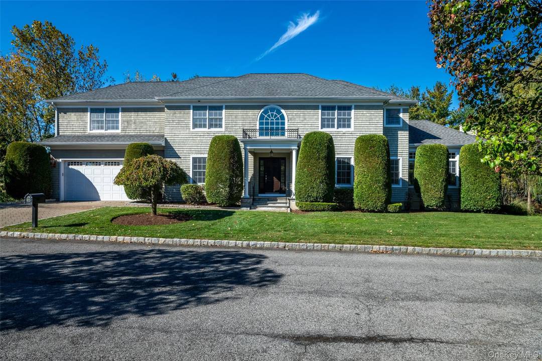 Located in the prestigious gated community of Pondview Estates in New Rochelle, 1 Mill Pond Lane is a distinguished Center Hall Colonial offering an exceptional blend of timeless design, fine ...
