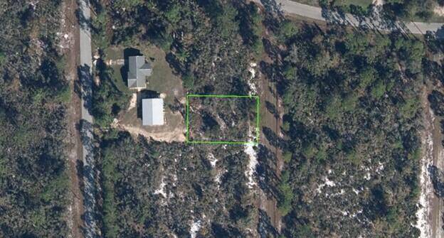 1 4 ACRE LAND LOCATED IN THE SOUGHT AFTER AREA OF LAKE PLACID, READY TO BUILD YOUR DREAM HOME.