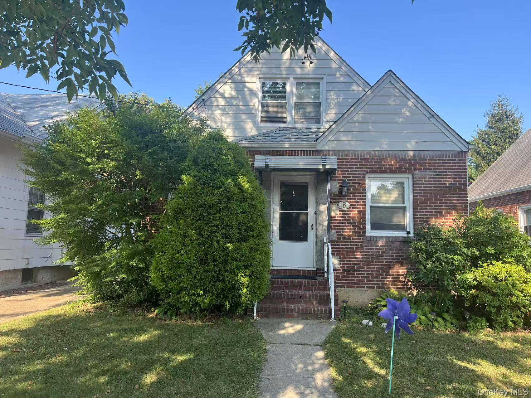 Welcome to this spacious 4 bedroom, 2 bath Cape nestled in the heart of beautiful Floral Park.