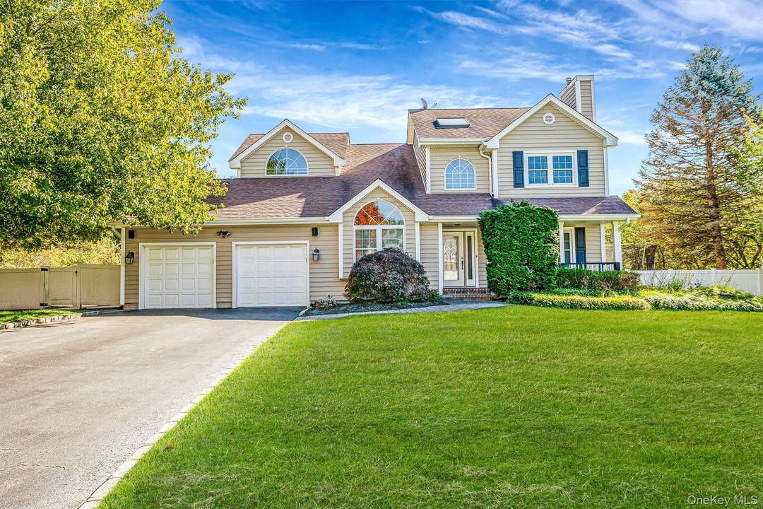 Don't miss this 4 bedroom Commack Country Estates Colonial beauty with an amazing resort like backyard.