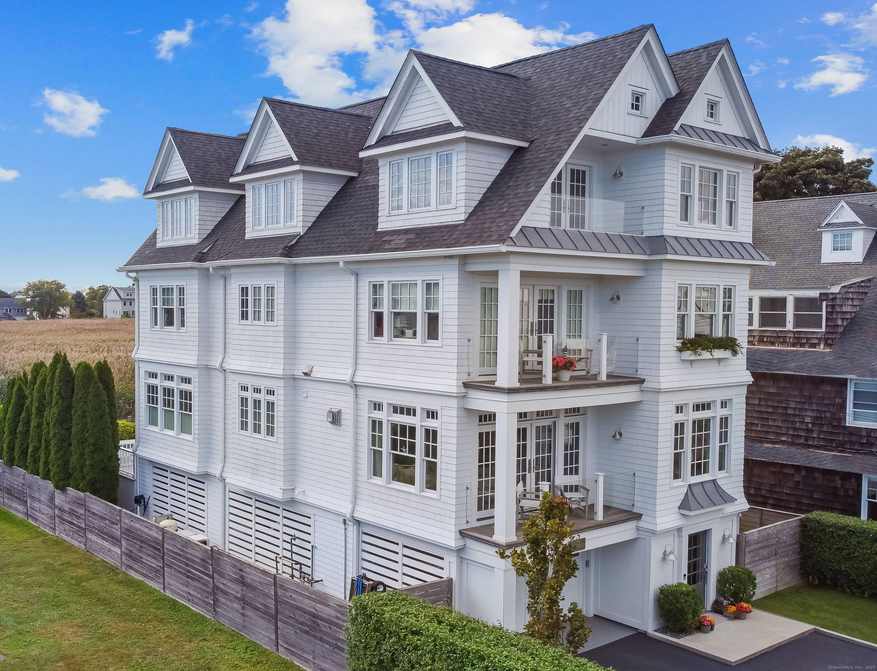 Enjoy life just 44 steps from a private beach path in this completely renovated coastal home, where every detail has been designed for year round enjoyment.