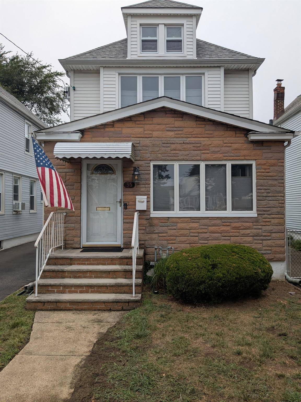 Lovely tree line colonial offers timeless charm with modern updates.