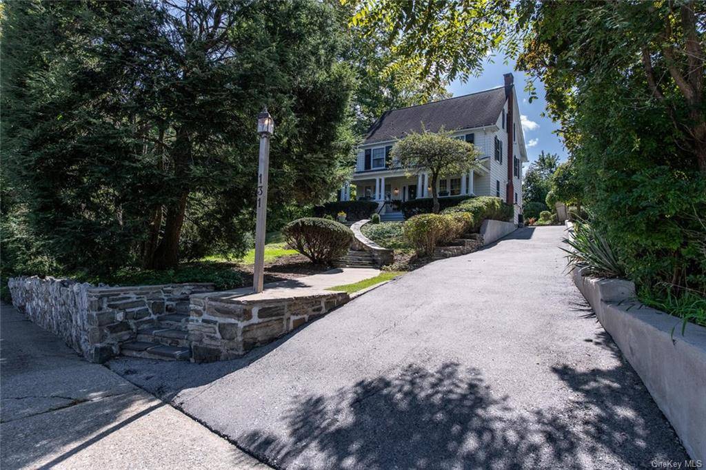 This Hooker Avenue gem, tucked away behind a row of mature trees, is simply stunning.