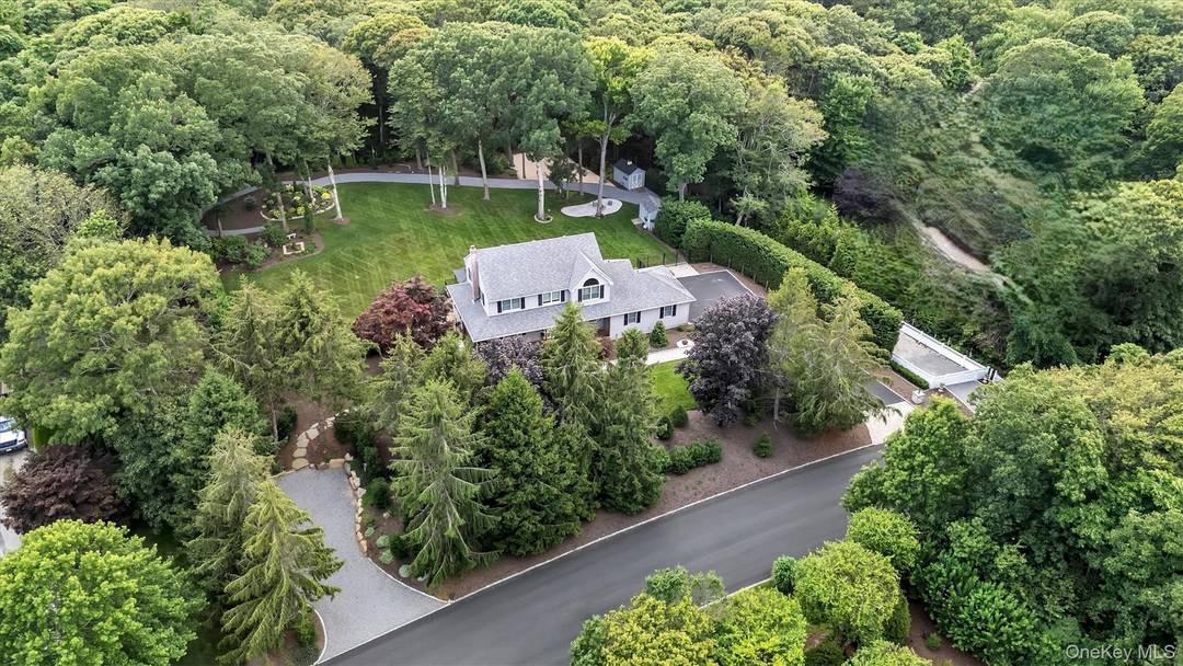 Nestled within Baiting Hollow Estates on Long Island's North Fork, this well maintained home offers the perfect blend of comfort, privacy, and coastal living.