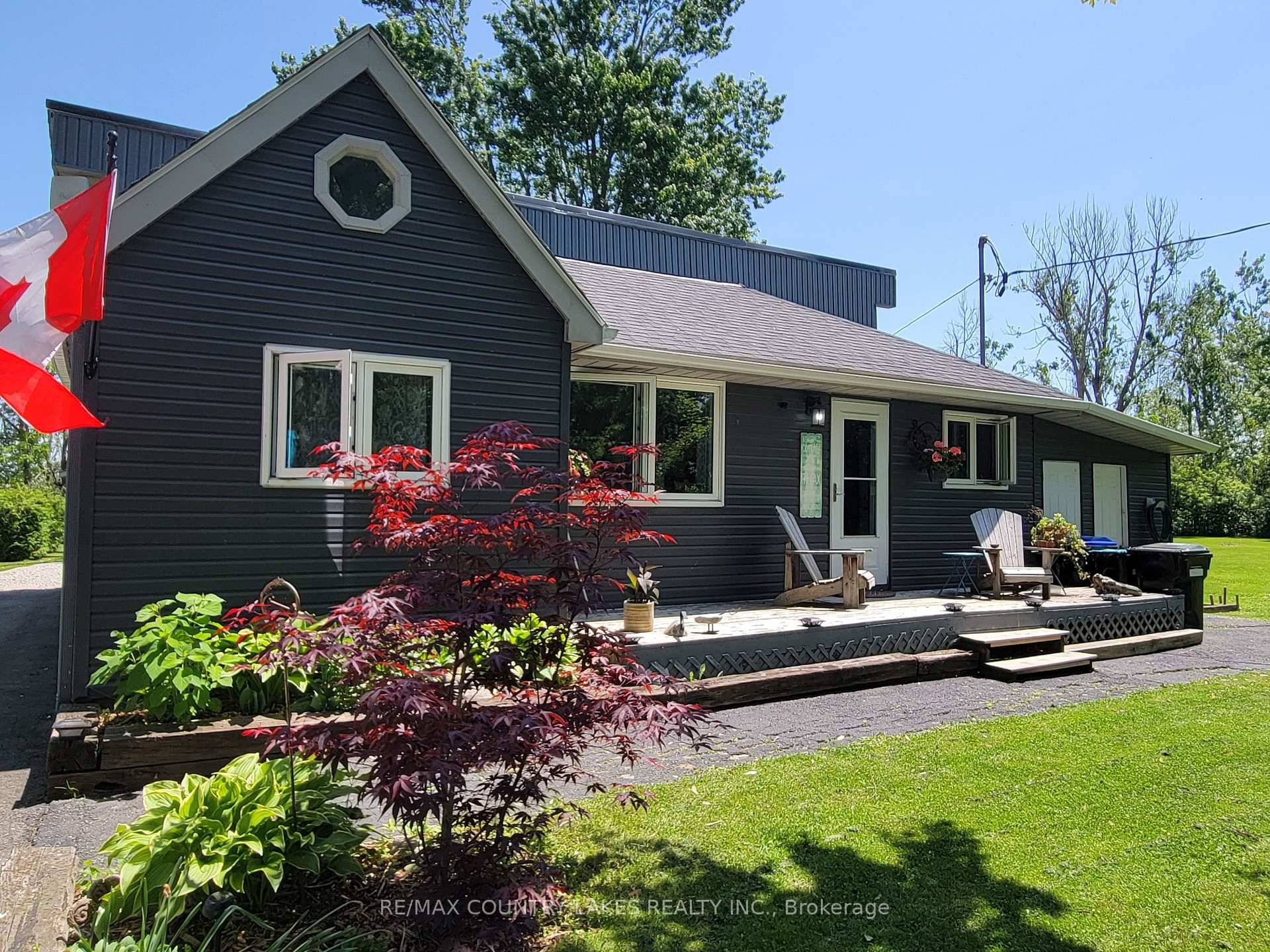 Welcome home to your 4 season home sitting on a large private lot across from Lake Simcoe.