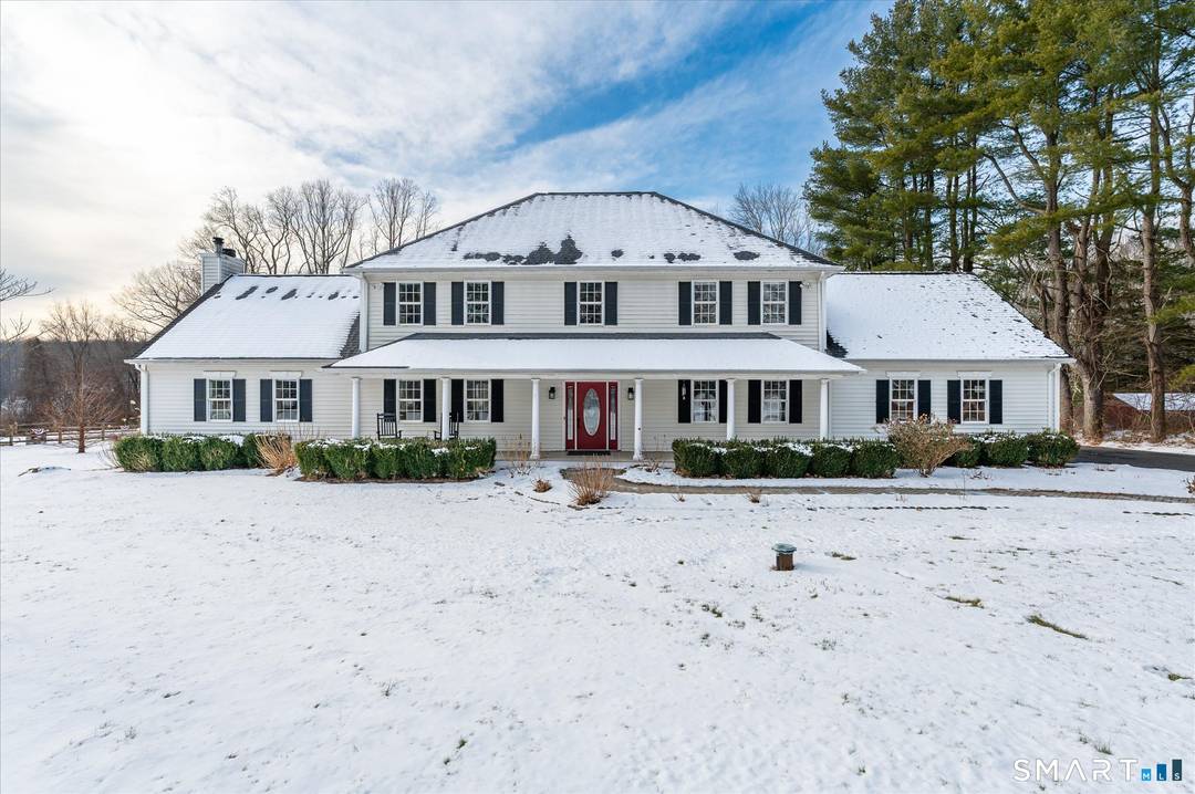 Welcome to this charming Colonial set on over 2 acres.