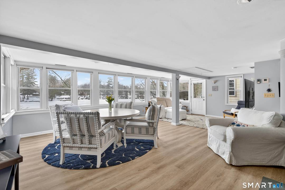 Nestled within the coveted Guilford Lakes Association, this charming 936sf ranch offers a refined retreat where modern efficiency meets the tranquil allure of lakeside living.