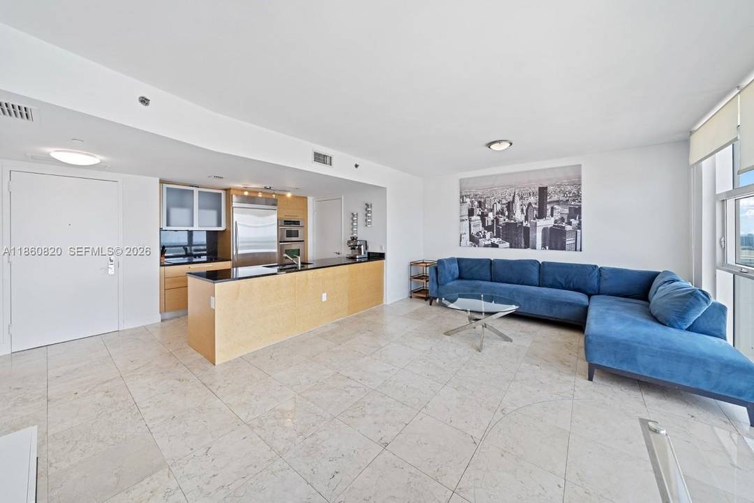 Lower Penthouse living awaits in this 49th floor 1 bedroom, 1 bath residence at Beach Club Two in Hallandale Beach.