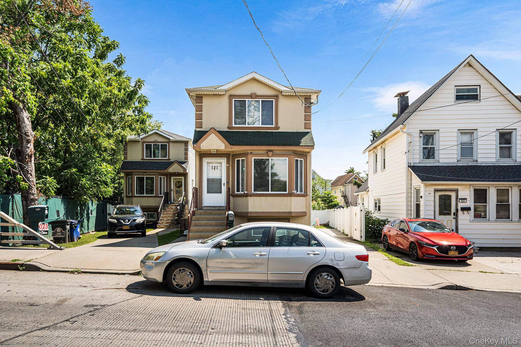 Welcome to 121 Union Avenue, a beautifully renovated 2 family home in Staten Island !
