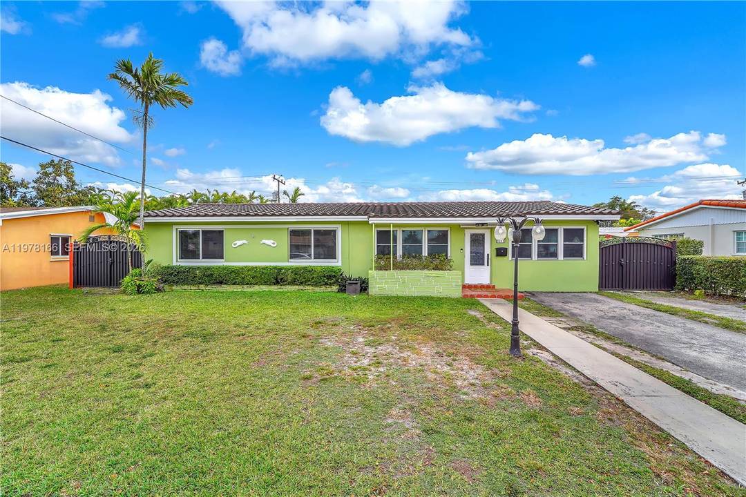 Stunningly expanded 5 bedroom, 3 bathroom residence in the desirable Coral Park Estates.