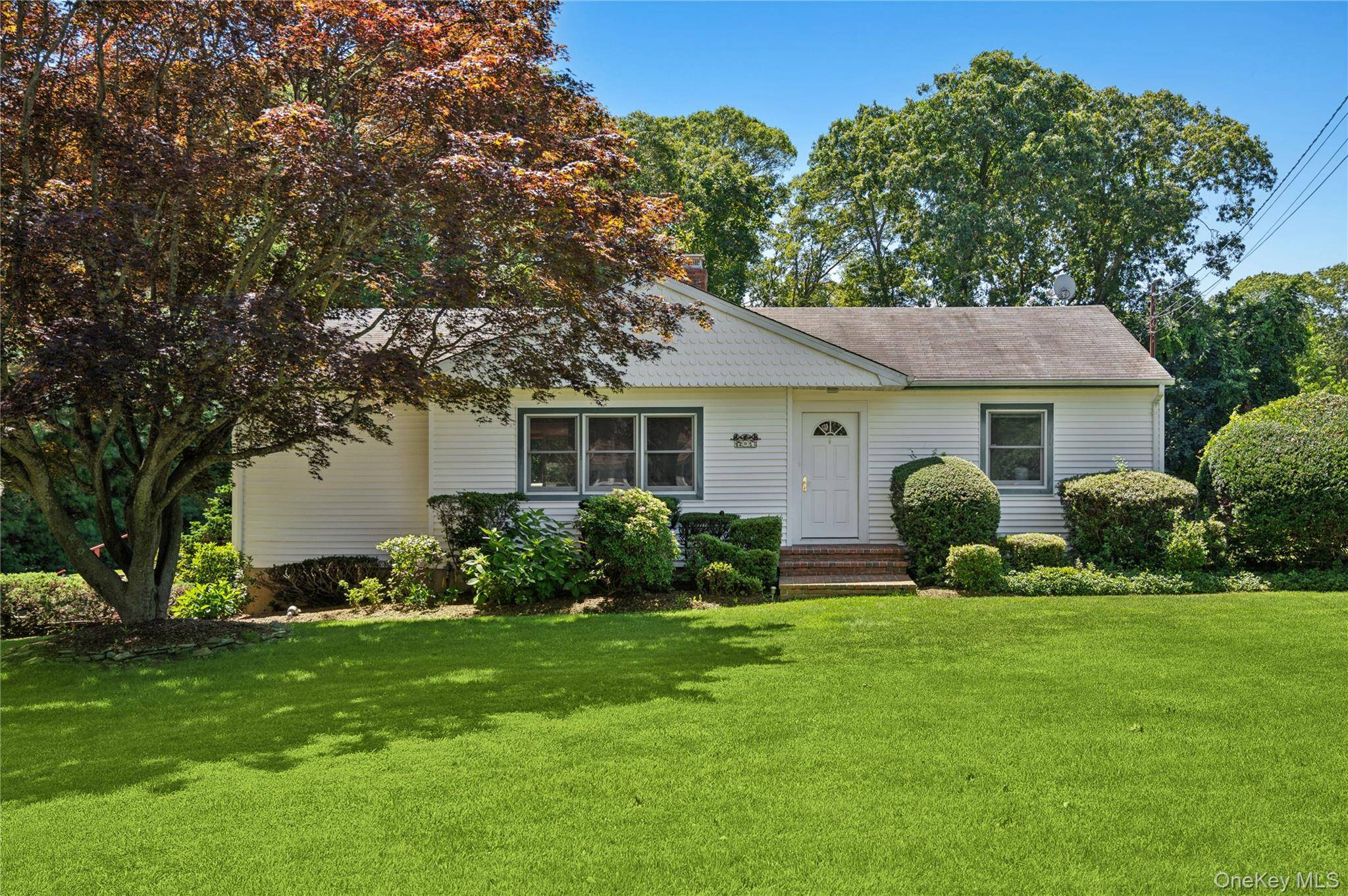 Located minutes away from the heart of downtown Hampton Bays, this 3 bedroom, 2.