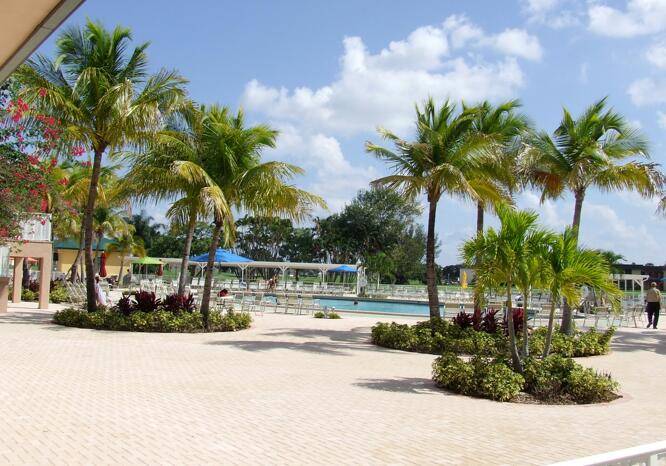 Home is maintained very well in a 55 community with so many amenities and only 6 miles from the ocean and downtown Delray.