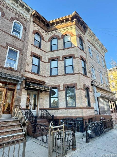 Welcome to this spacious 3 family brick home offering 3, 318 sq.